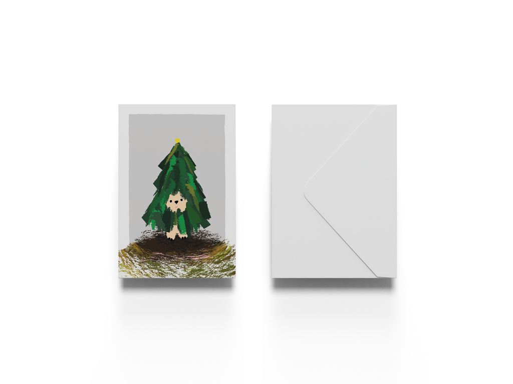 Greeting card with a Christmas tree design and envelope on a white background