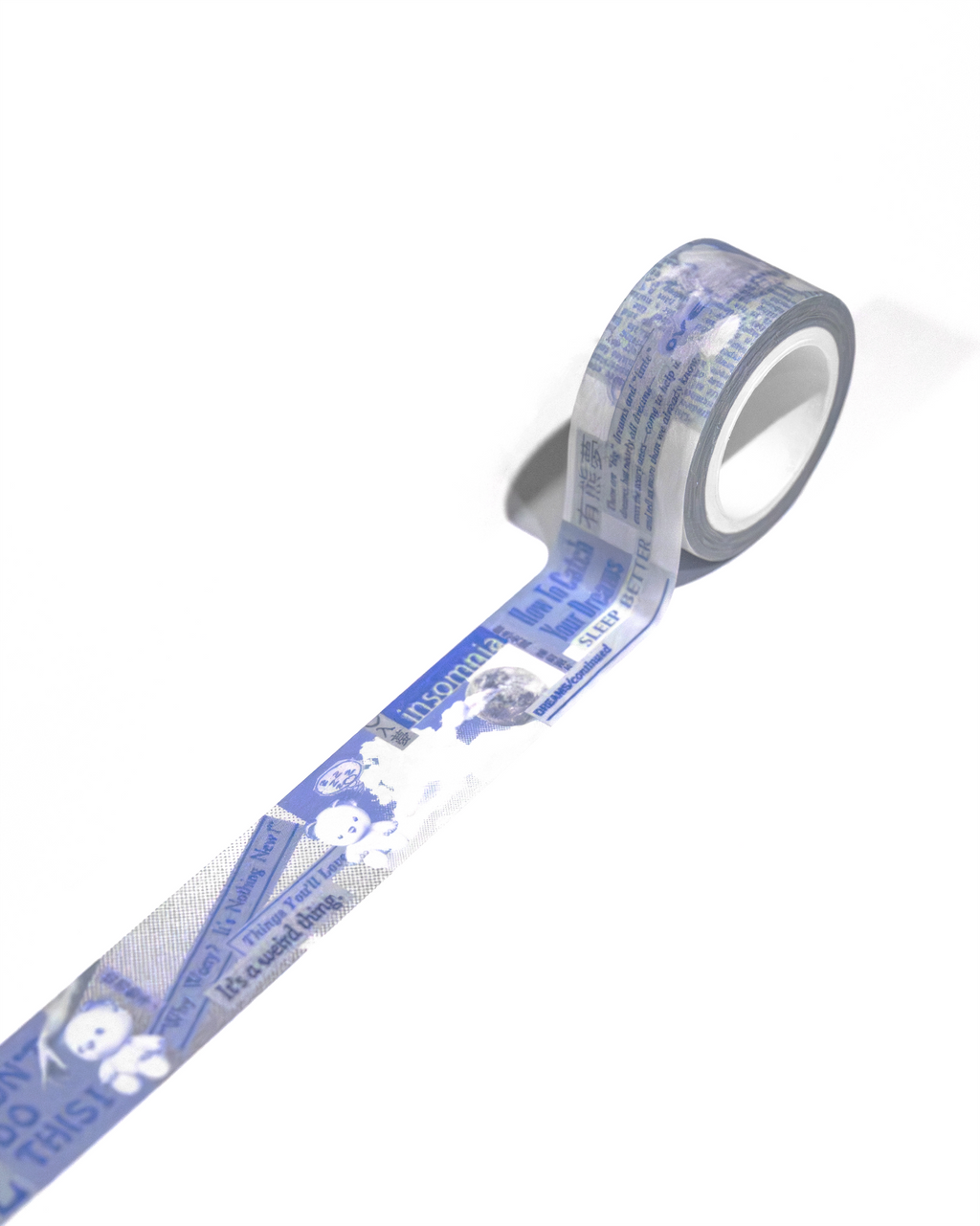 Roll of washi masking tape with printed text