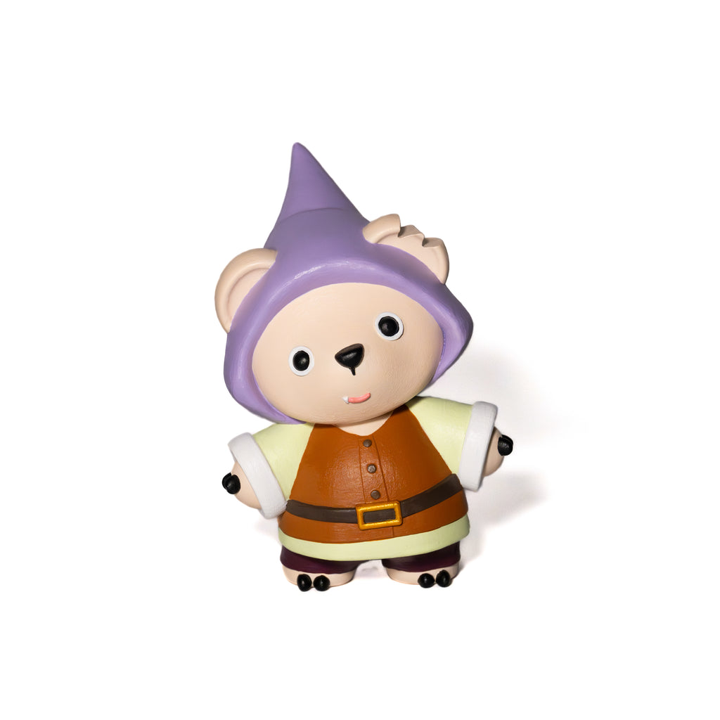 Designer Toy figure of a bear with a purple hat and brown gnomes outfit