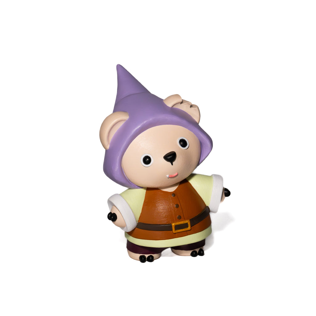 Designer Toy figure of a bear with a purple hat and brown outfit