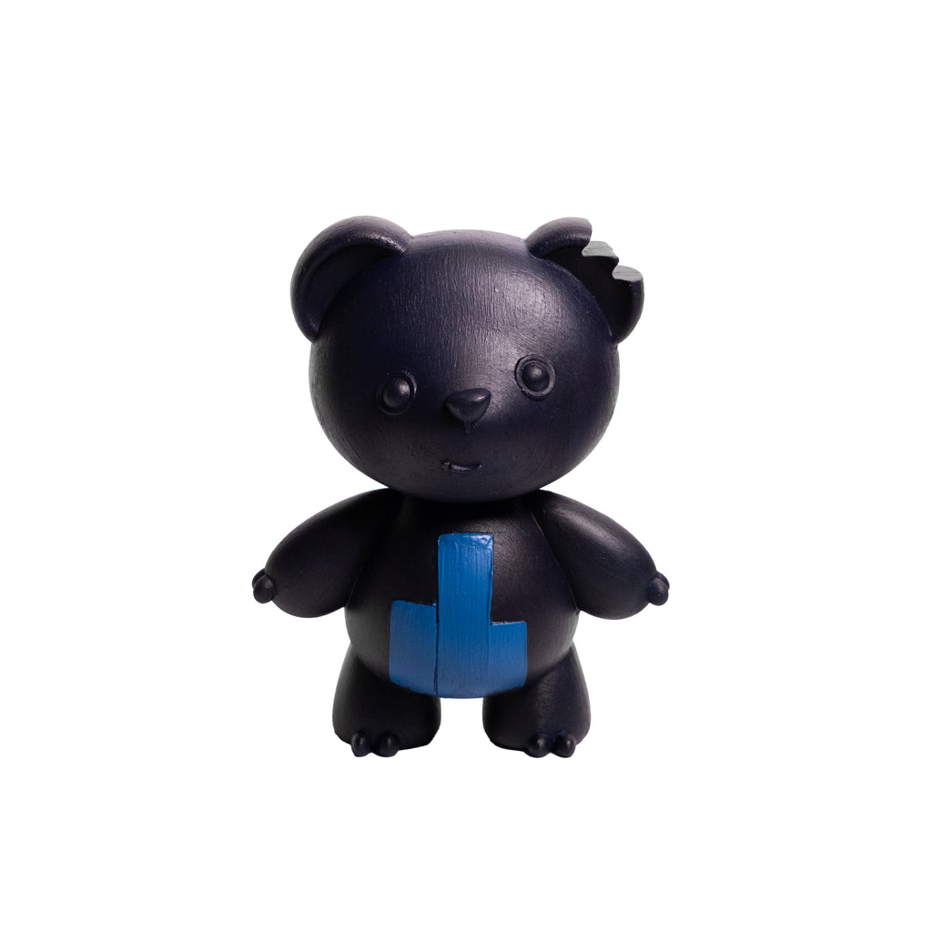 A small black bear figurine with a bright blue geometric chest design, centered on a plain white background.
