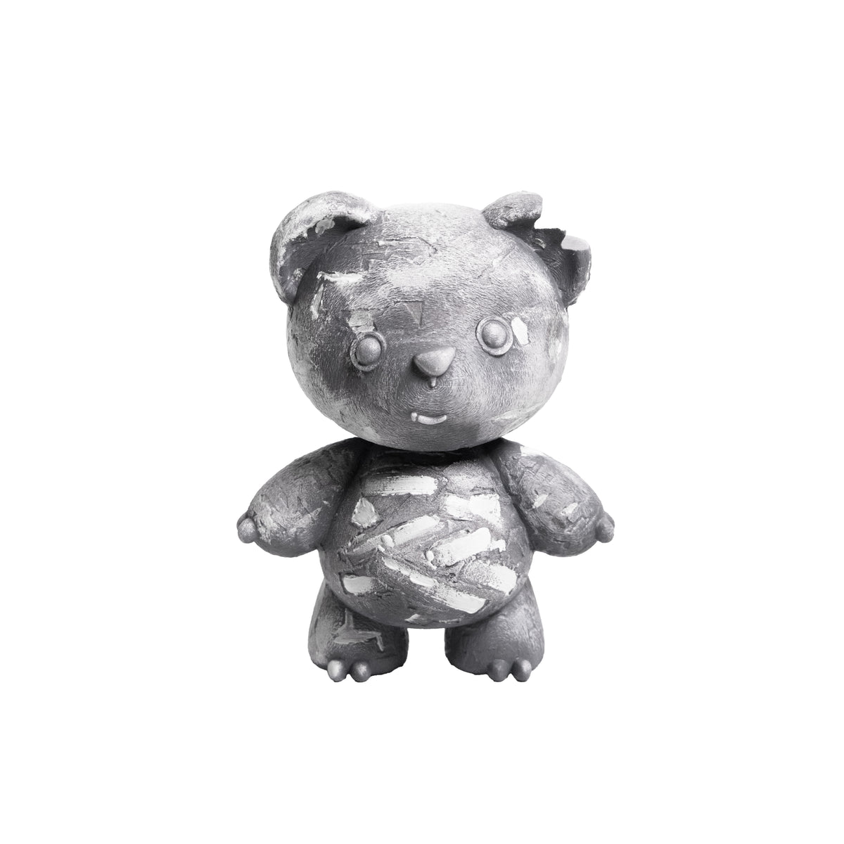 A distressed, weathered gray teddy bear figurine with chipped paint and a bandage pattern on its belly, isolated on a white background.