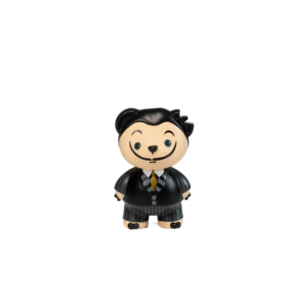 Toy figure of a character in a suit inspired by Salvador Dali