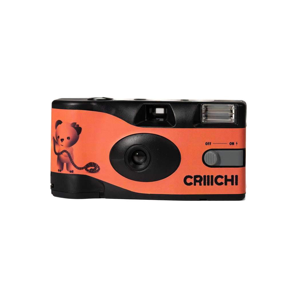 Orange and black disposable camera with 'CRIIICHI' branding