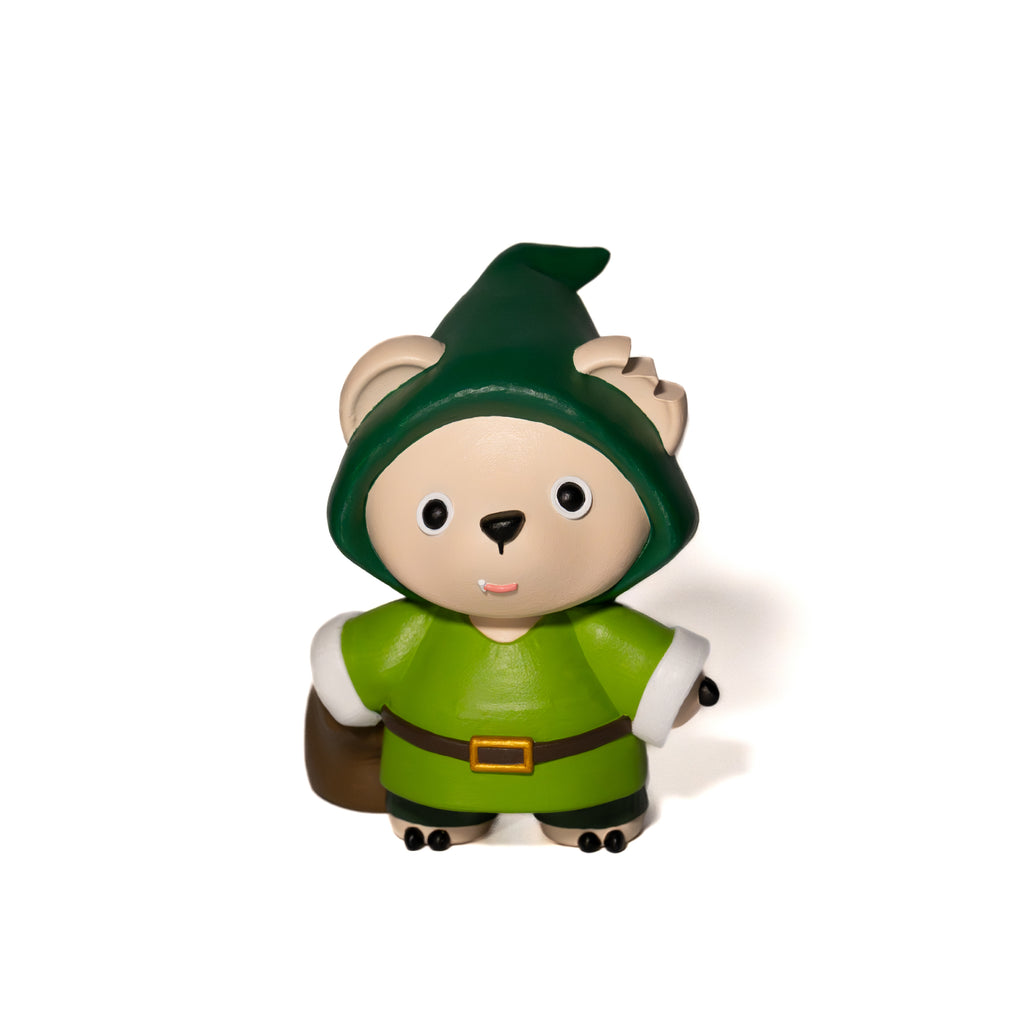 Toy figure of a bear in green gnomes costume holding a bag of gold coins